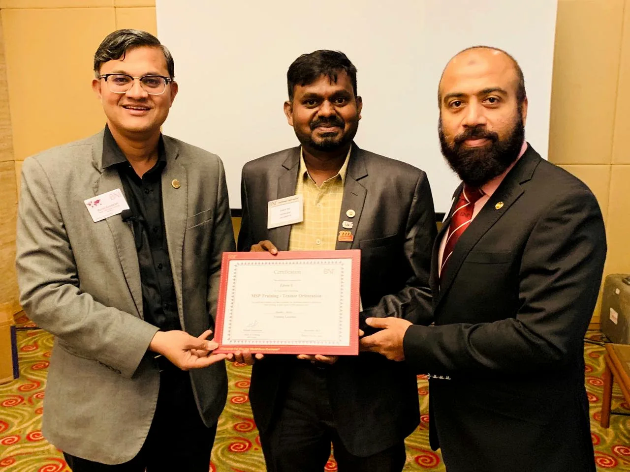 Win Landscape founder Edwin Raj receiving a BNI MSP training certification
